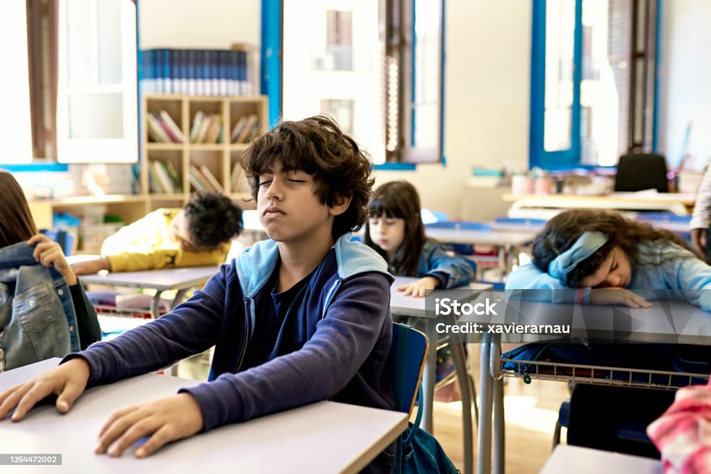 Well Rested Students In Class Students Pausing From Work For Classroom Rest Time Stock Photo ...