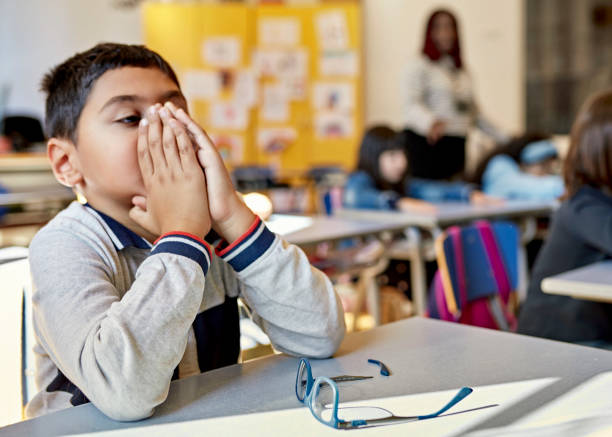 istock Young Boy Taking a Moment to Gather His Thoughts 1354472018
