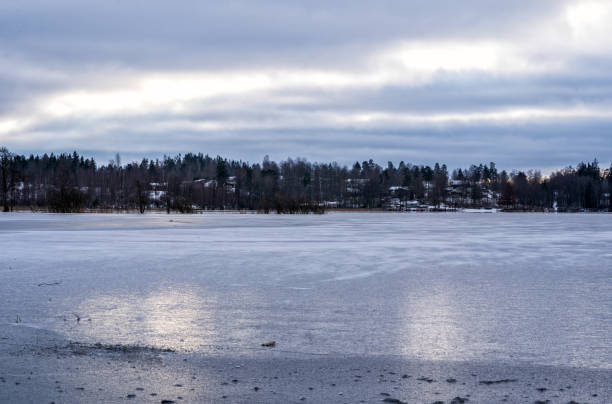 istock Frozen lake in midwinter, Sweden 1354473777