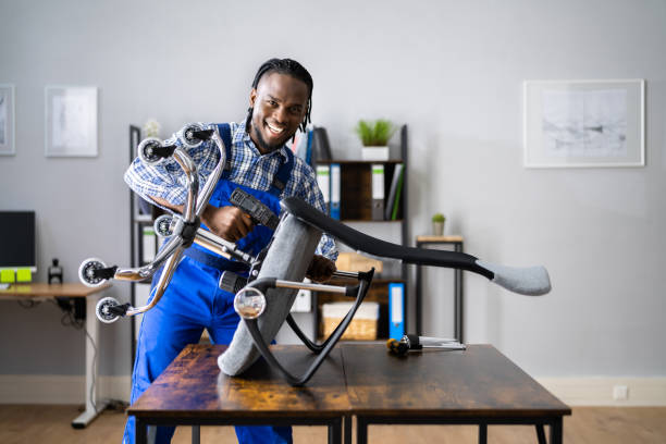 istock Office Chair Assembling And Repair. Man Working 1354481325