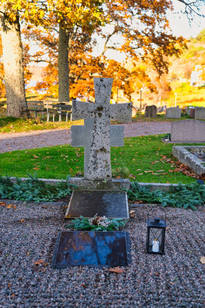 istock Beautiful Scandinavian cemetery landscape, autumn 1354485614