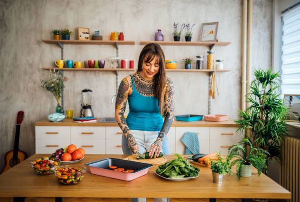 istock Woman preparing healthy meal 1354489015