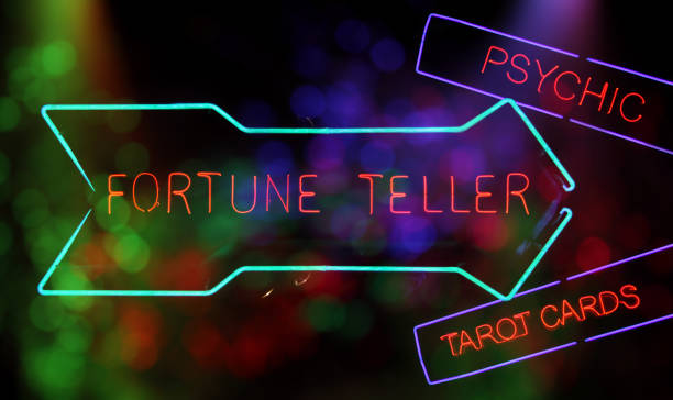 Fortune Teller Sign With Arrow and Colorful Bokeh stock photo