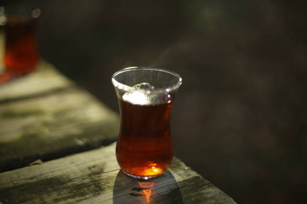 istock Turkish tea close-up on wooden desktop 1354491507