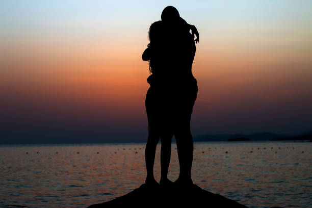 istock A couple in love at sunset 1354492126