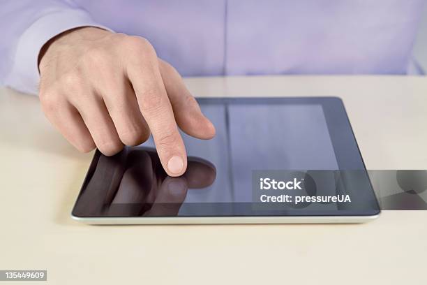 Businessman Touching On Tablet Pc Stock Photo - Download Image Now - Adult, Analyzing, Business