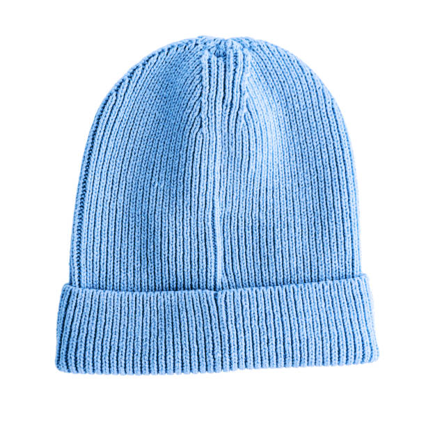 istock Knitted hat in blue, autumn spring season, light, isolated on a white background 1354508132
