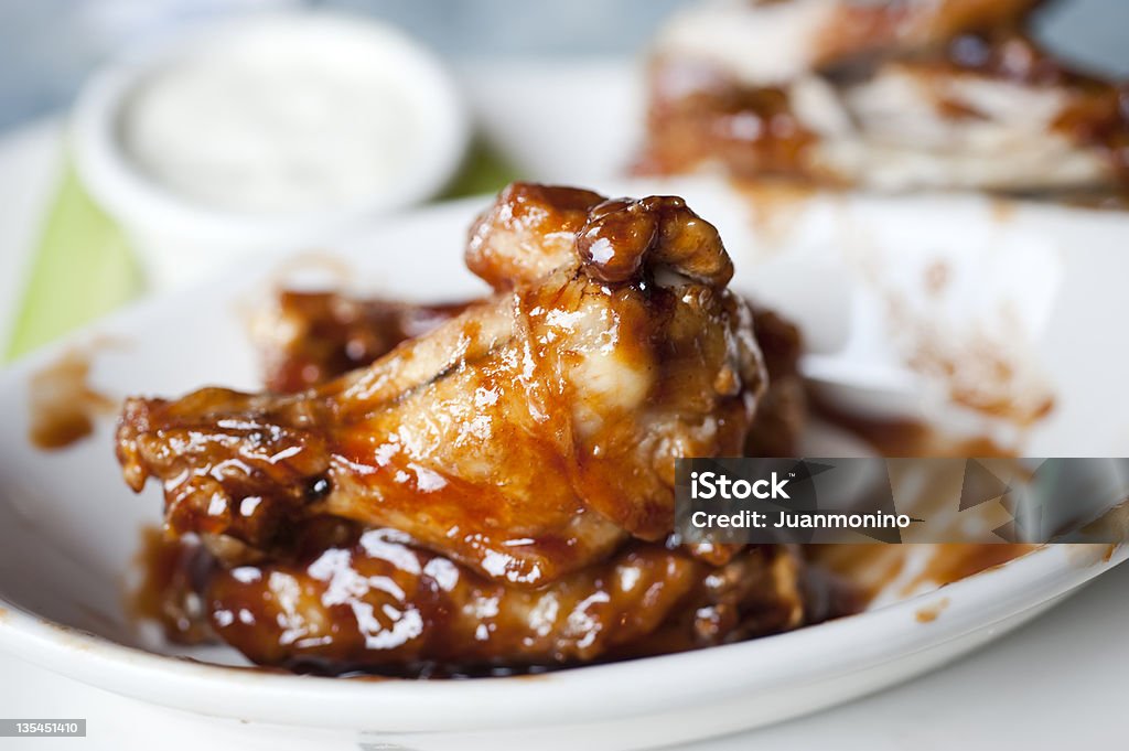 Buffalo wings Close up picture of a plate full of buffalo wings American Culture Stock Photo