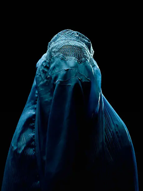 headshot of an Afghan woman wearing her burkha veil  (this picture have been shot with a Hasselblad HD3 II 31 megapixels) 