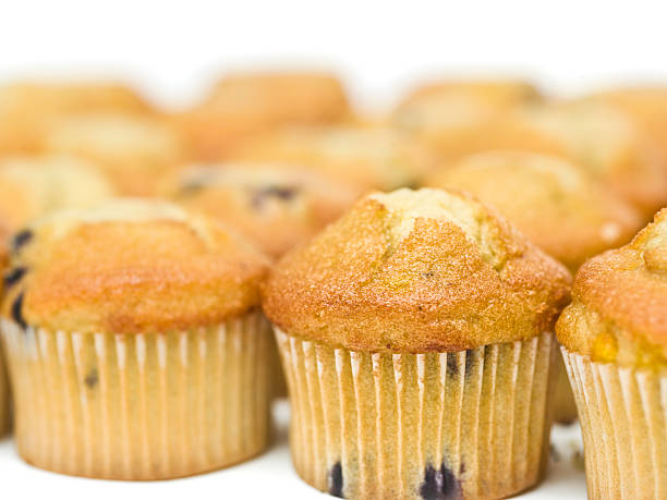 Blueberry muffins lot of blue berry muffins in formation  (this picture has been taken with a super high definition Hasselblad H3D II 31 megapixels camera) madalena stock pictures, royalty-free photos & images