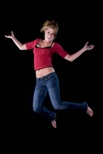 istock Young woman jumping 135452304
