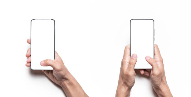 istock Man hand touching smartphone with blank screen. Mock up 1354523179