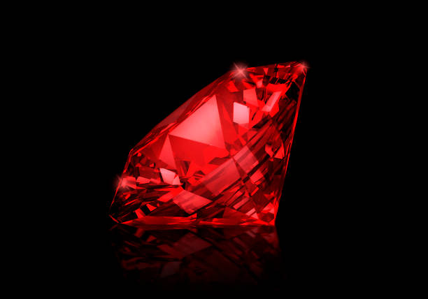 istock Dazzling diamond red gemstones on black background 1354528704