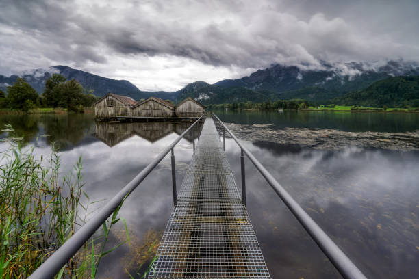 istock Fishing cabins on the lake on a cloudy day. Germany 1354533464
