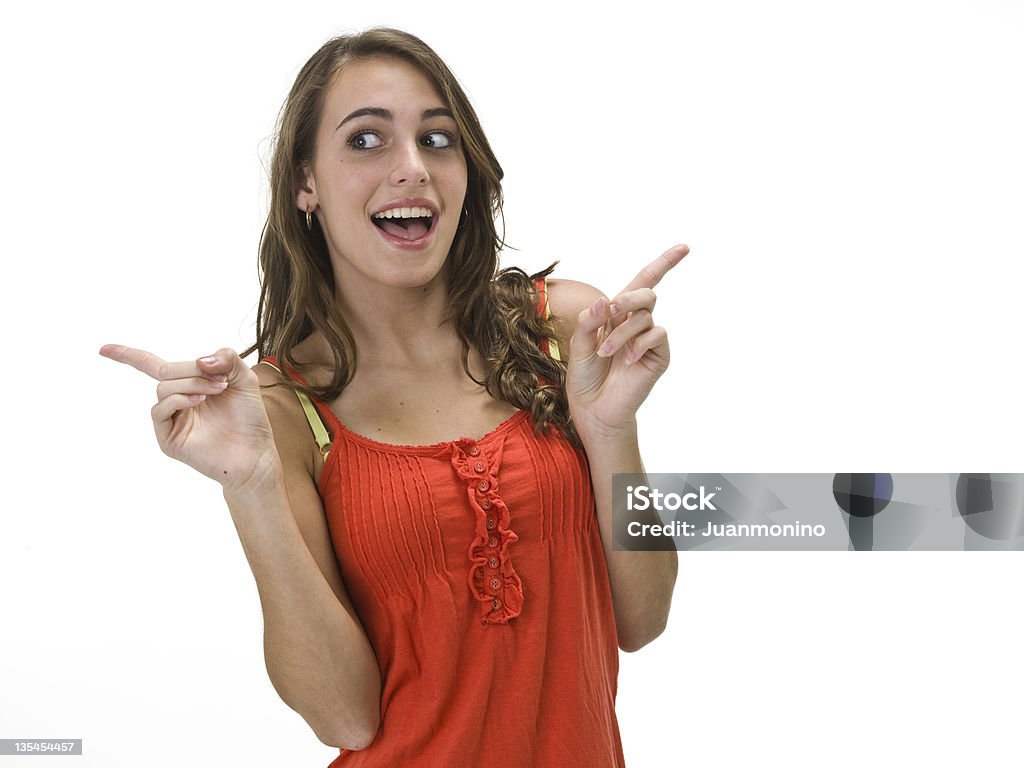 Belle jeune fille pointant du doigt - Photo de Jeunes filles libre de droits