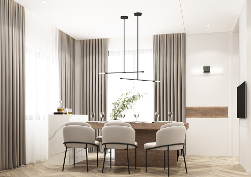 Luxurious modern dining room boasts a black dining table illuminated by a rectangular chandelier and surrounded by gray velvet dining chairs over taupe sisal rug finished with rustic console table.