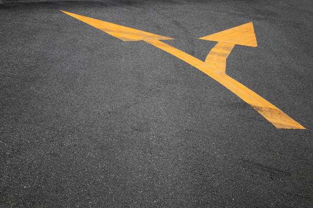 istock Arrow ahead or turn rigth on street 1354553088