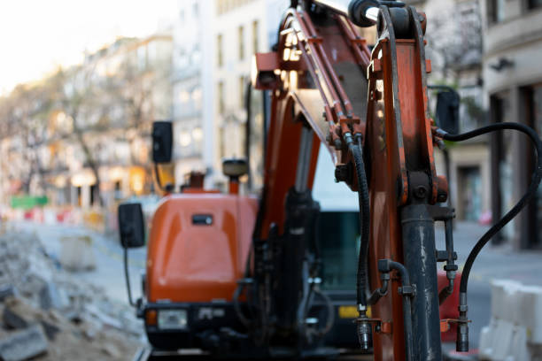 istock Excavator on urban street 1354562306