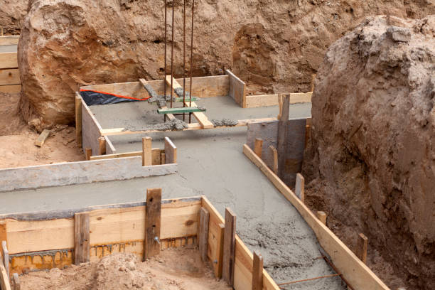 istock Preparation of formwork with reinforcement for a newly built house 1354567685