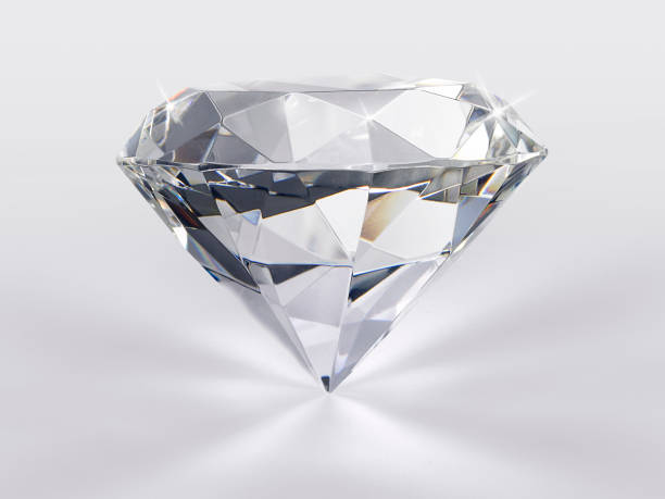 istock Shiny brilliant diamond placed on gray background 1354568568