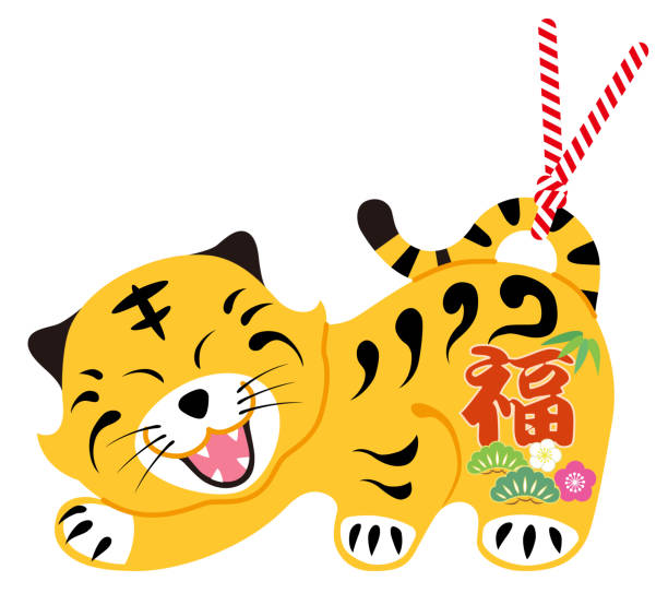 istock Japanese traditional zodiac tiger bell, isolated on white background 1354570784