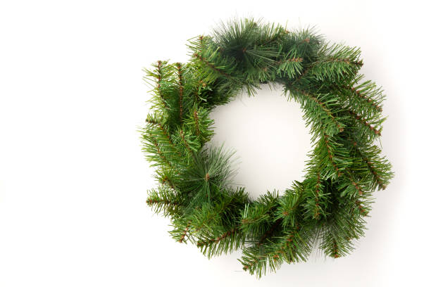 istock christmas wreath on a white background 1354573025