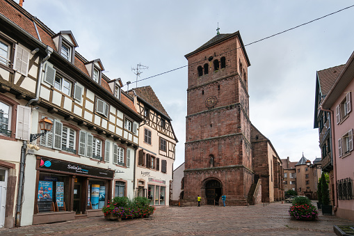 Saverne, France - September 19, 2021: A square next to the church. The church was first built in the 12th century as a parish church before being re-consecrated to saint Bartholomew in the late 13th century.