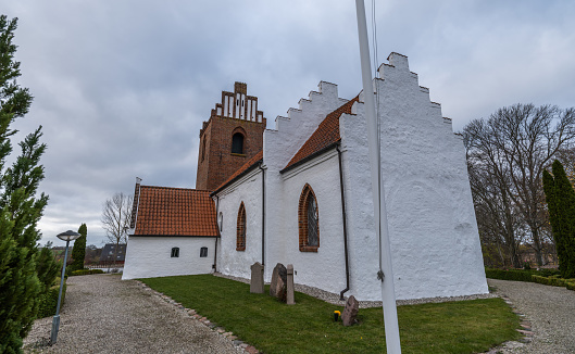 Kirkerup Church was built in romanesque style around 1100 AD. The gothic tower was added in the 15th century. The church contains beautiful frescos from the 12th and 13th century and a carved pulpit from 1639 AD.