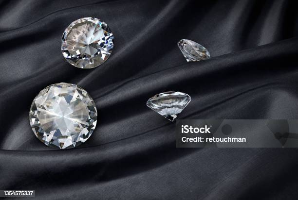 Diamond On Black Fabric Background Stock Photo - Download Image Now - Diamond - Gemstone, Diamonds - Playing Card, Diamond Shaped