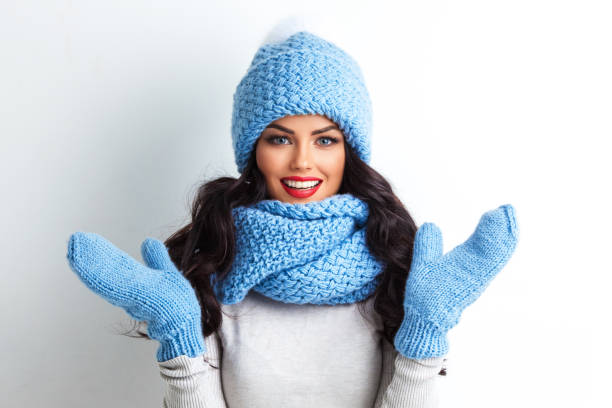 istock Happy surprised winter woman 1354577386