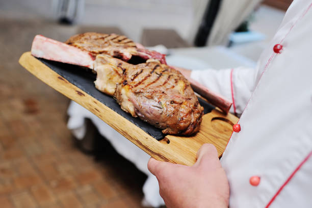 istock master class for cooking meat for the guests of the restaurant 1354580932