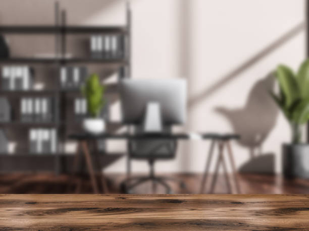 istock Table for product display with blurred light beige manager office on background 1354584041