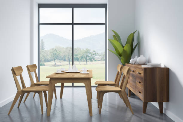 istock White dining room interior with furniture and window, mockup 1354585741
