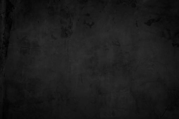 istock Close up retro plain dark black cement & concrete wall background texture for show or advertise or promote product and content on display. 1354585793
