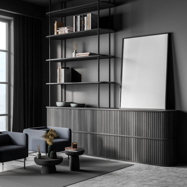 istock Grey living room with standing canvas and blue armchairs. Corner view. 1354586520