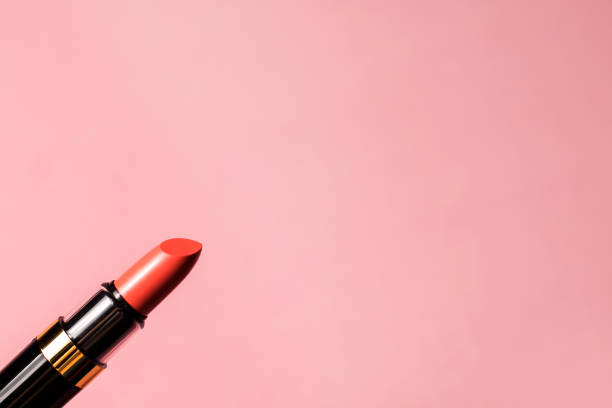 istock Banner of red lipstick on a pink background with space for text 1354587567