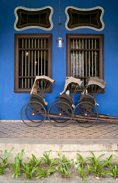 istock Rickshaws at Cheong Fatt Tze Mansion 135458785