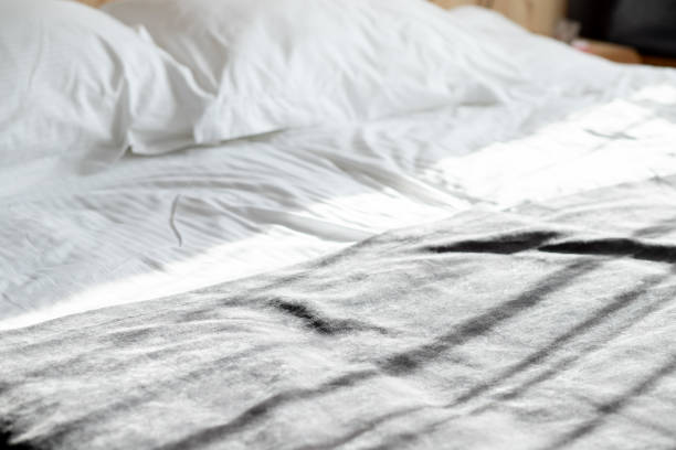 istock motel bed,clean bed linen made on the bunk 1354589802