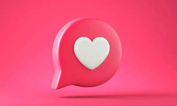 Photo of Like heart icon on pink background