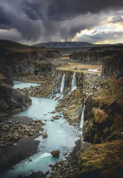 Photo of Beautiful sunset and landscape of Sigoldugljufur canyon with many small waterfalls and the blue river in Highlands of Iceland