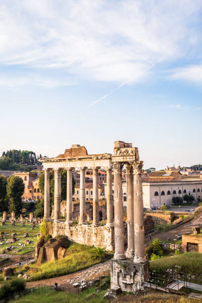 istock Sunrise light with blue sky on Roman ancient architecture in Rome, Italy 1354597675