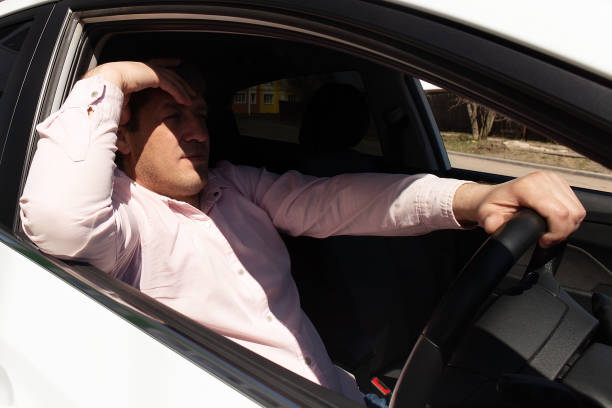 istock One man is sitting in the car. Lifestyle 1354602051