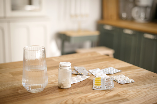 medicines and water on the table