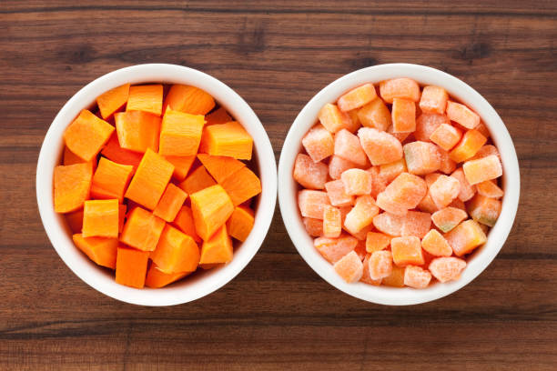 istock Fresh and frozen carrot cubes 1354608631