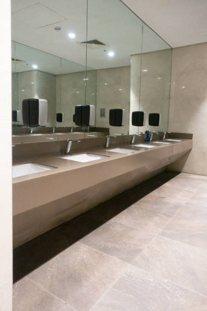 Public restroom Wide angle view of public restroom restaurant mirror stock pictures, royalty-free photos & images