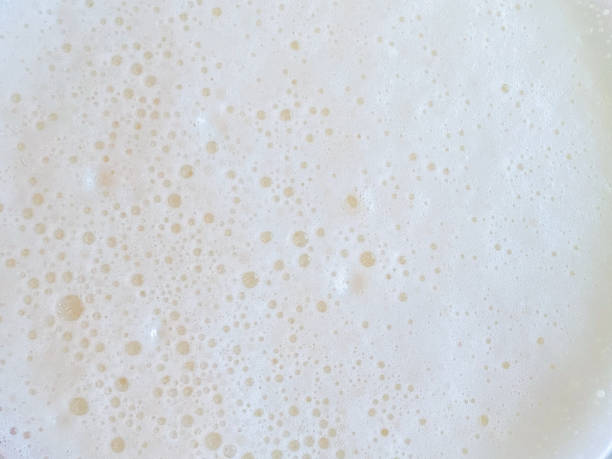 Beer foam Beer foam texture for background frothy drink stock pictures, royalty-free photos & images