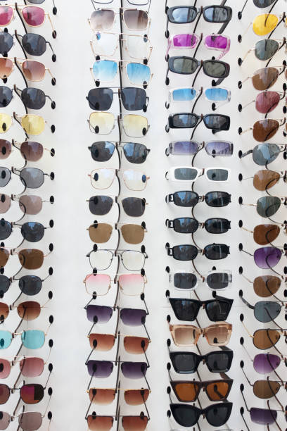 istock Sunglasses for sale, placed on the shelves 1354615845