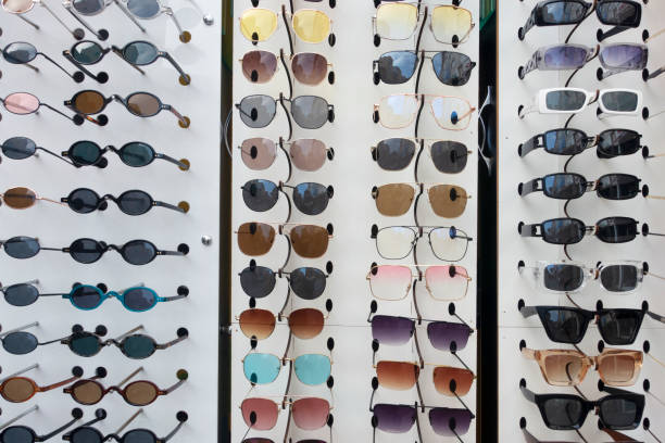 istock Sunglasses for sale, placed on the shelves 1354615874
