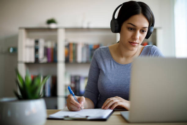 istock Young woman working from home 1354627419