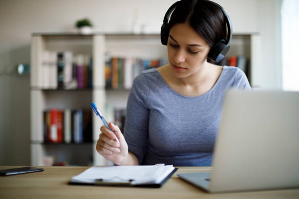 istock Young woman working from home 1354627927
